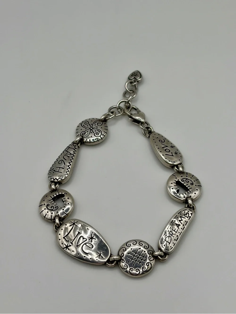 Brighton “Love Tags” Silver Retired Laugh Live Dream Heart Bracelet